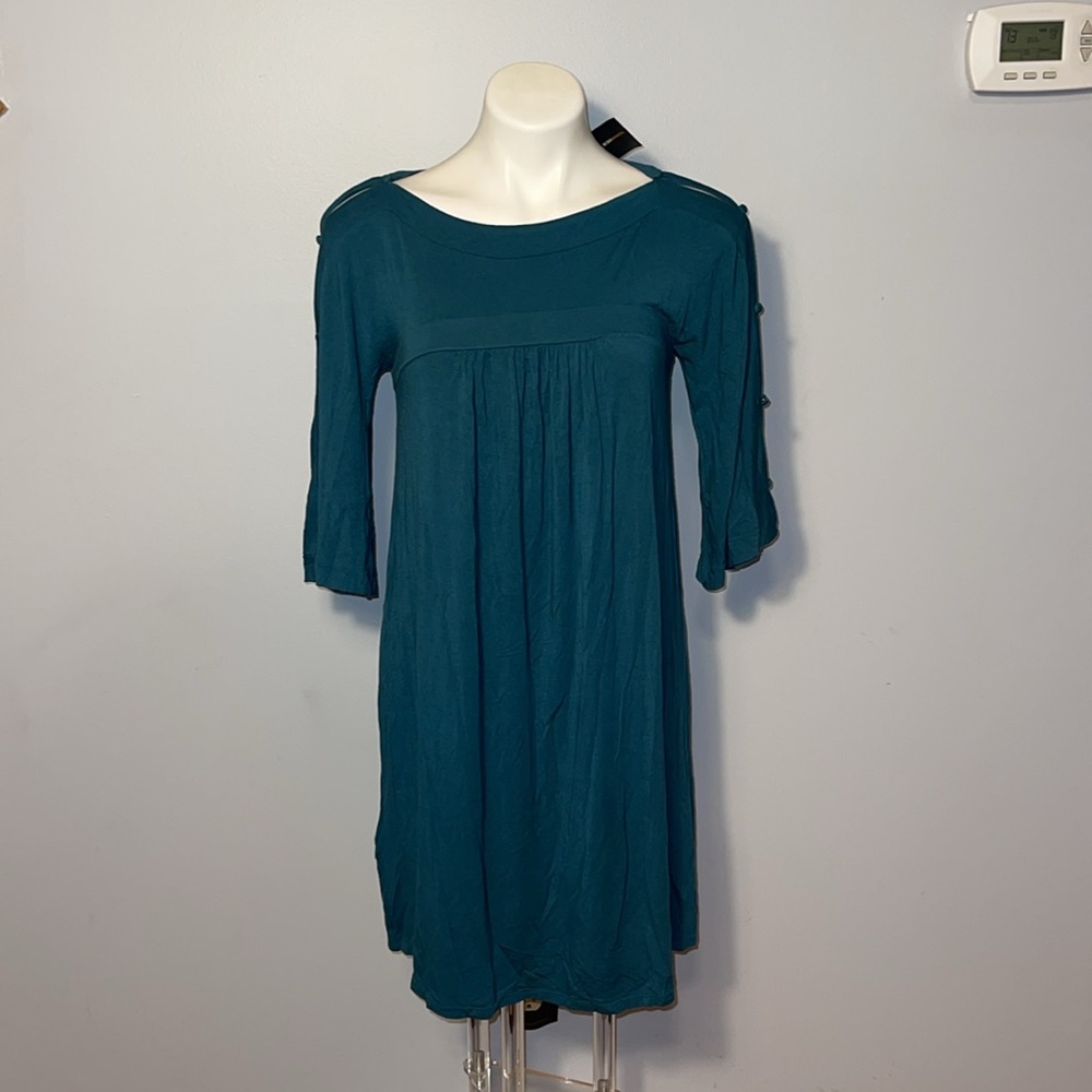 BCBGMaxazria ladies Jersey Knit Dress with 3/4 sleeves. Size medium. NWT.